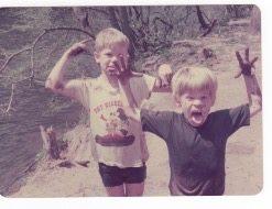 Not sure if the date on this is correct or not. Steve and Scott on a teacher camping trip, playing on a mud slide. 
