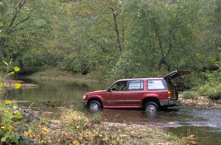 A Rented Explorer, stuck in the river at Chip's cabin