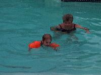 Grandma D chases Jordan in the pool