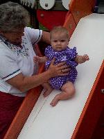 Childrens Museum Houston - Jada sliding with Grandma