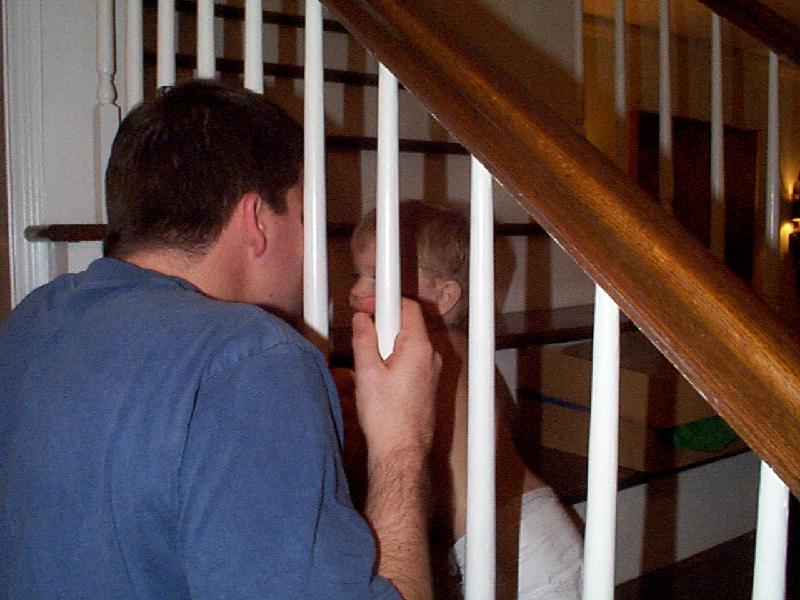 Scott and Jada playing on the stairs