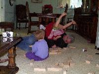 playing with blocks and wrestling