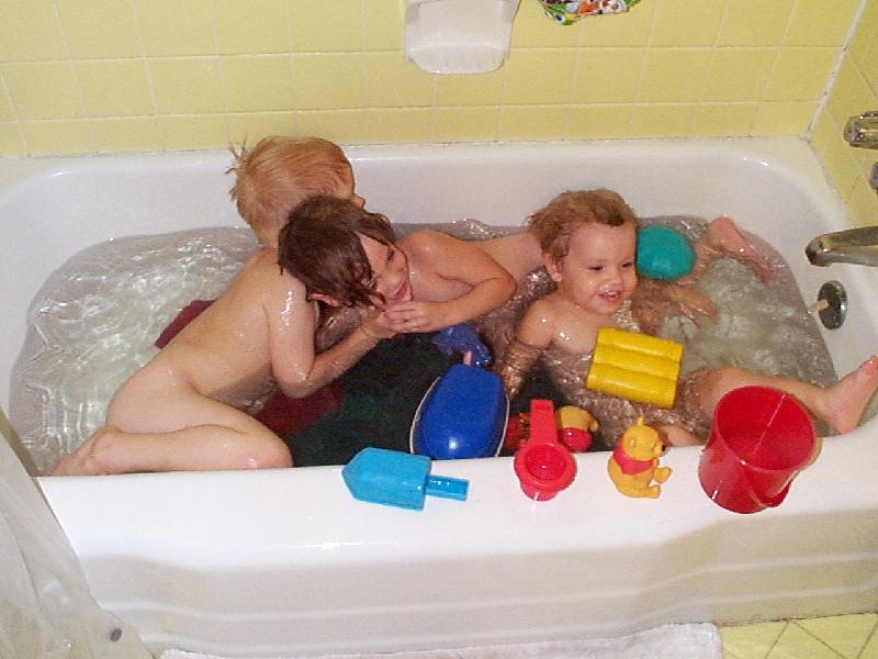 Kids playing in the tub