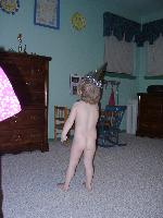 Jada in her birthday hat and birthday suit