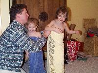 Jordan and Jada modelling the towels their Aunt Leann made for them for Christmas