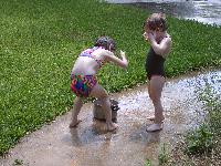 Both girls liked playing in the sprinkler and getting very wet