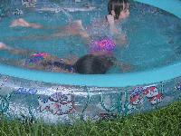 Jada and Mara swimming with faces in