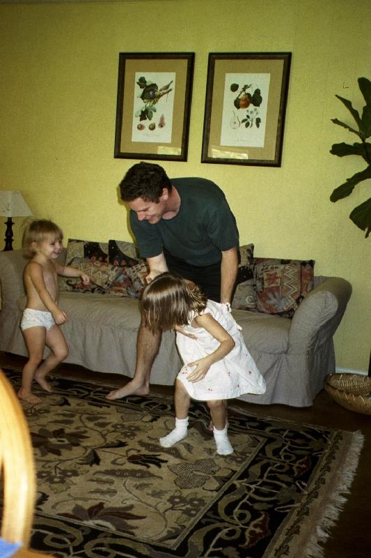 Papa dancing with his girls