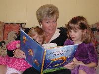 Grandma reading to Jordan and Jada - 