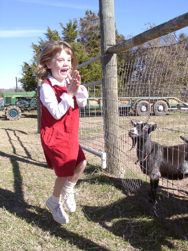 Jordan was just a <i>little</i> excited about feeding the goats...