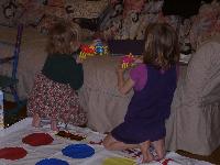playing with cooties on the couch, getting ready for TWISTER!