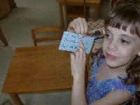 Jordan's turn - showing me her card