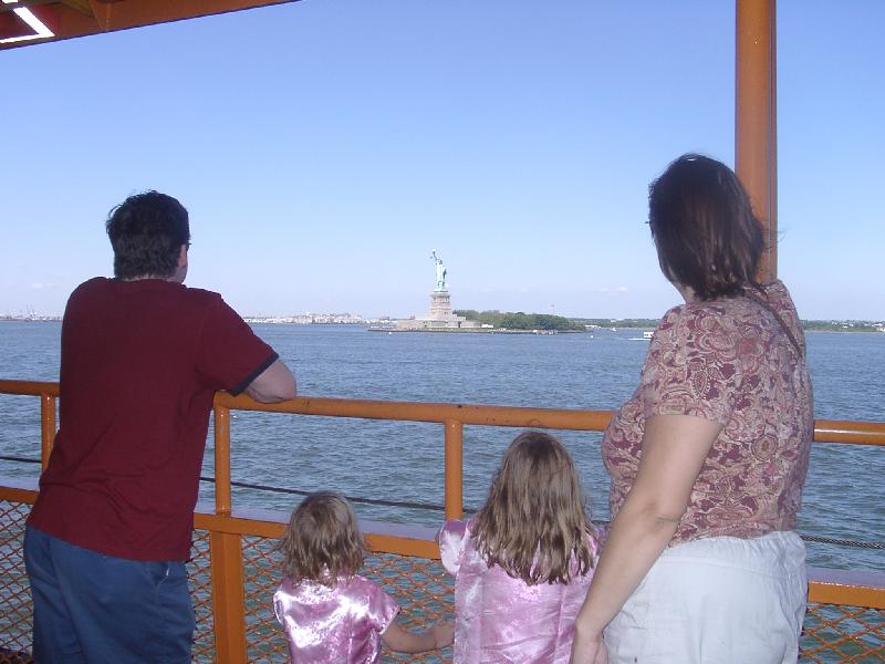 Uncle Scott, the girls, and Julie admiring the Statue
