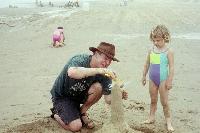 Papa and Jada (mostly Papa) working on a sandcastle
