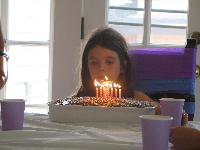 Lily blowing out the candles