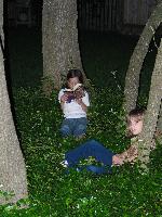 Jordan and Jada reading in the ivy