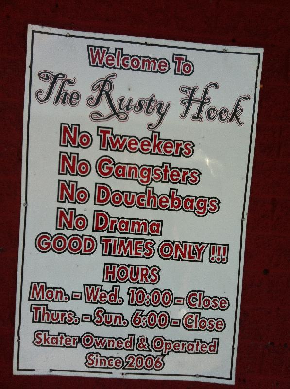 Sign at The Rusty Hook Bar, Manteca California. We didn't go in, but ate at a Mexican restaurant next door. 
