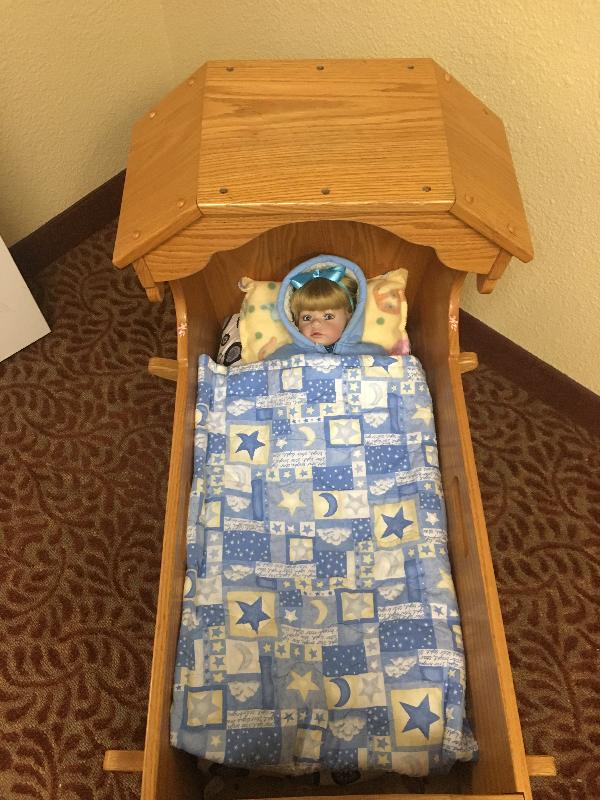 Creepy doll at the memory care facility where Julie's Aunt Jerri is living now. 
