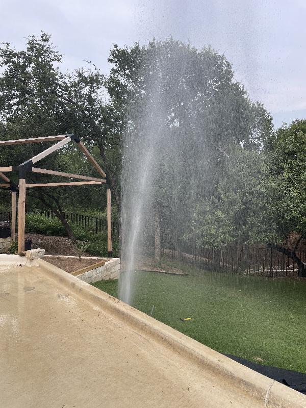 Oopsie! Putting in some conduit to support the fence, hit the irrigation line. 
