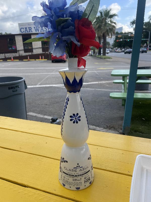 Cute vase at a taco trailer 
