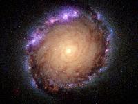 Composite ultraviolet-visible-infrared image of NGC 1512