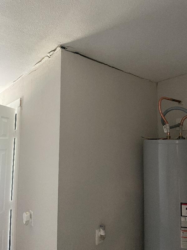 June 2022 <br/><br/>This shows some cracks, but they are somewhat minor, and it is before major work starts, so it isn't clear if the cracks are a cause or an effect. It might be that the crack are the <i>reason</i> we had the foundation company come in - that the laundry room addition was starting to move separately to the main house.<br/><br/>Cracks in Laundry room drywall