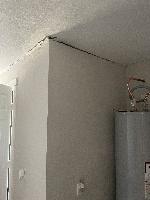 June 2022 <br/><br/>This shows some cracks, but they are somewhat minor, and it is before major work starts, so it isn't clear if the cracks are a cause or an effect. It might be that the crack are the <i>reason</i> we had the foundation company come in - that the laundry room addition was starting to move separately to the main house.<br/><br/>Cracks in Laundry room drywall