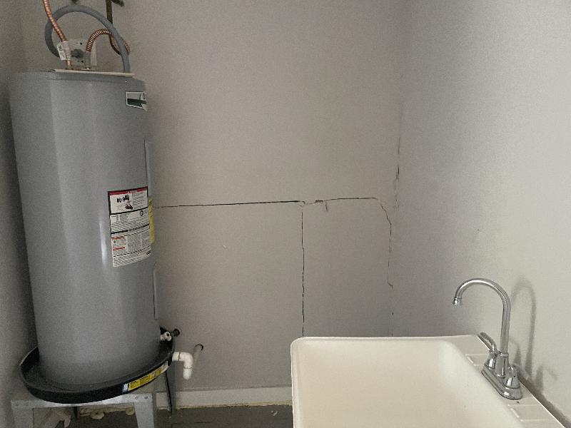 July 14 2022 - laundry room - some cracks (compare to later cracks) 