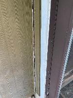 Photo by pest control showing laundry room addition separating from house near deck 