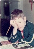 Steve, somewhere around 1976. Frustrated with schoolwork, apparently. 