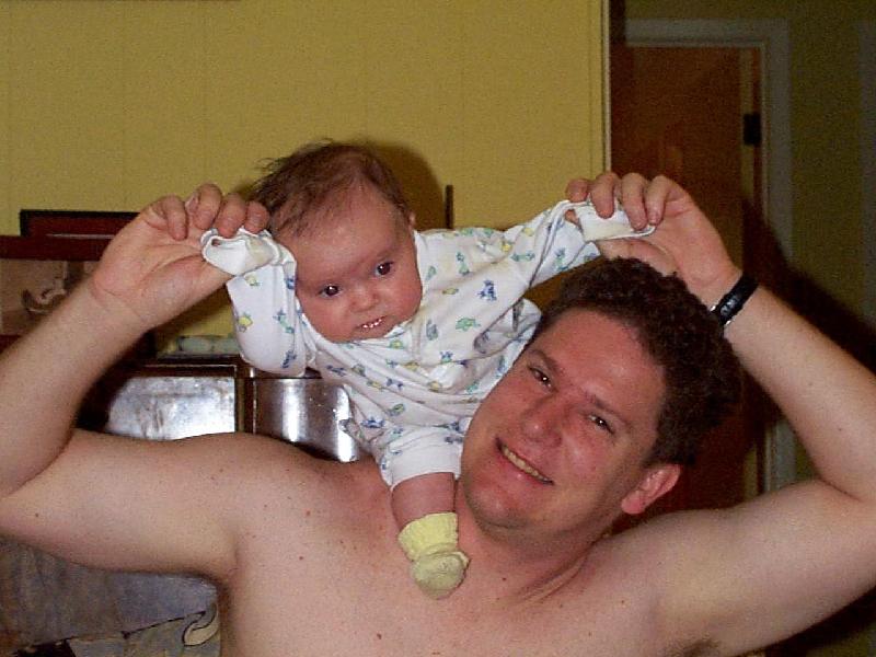Jada on Papa's shoulders
