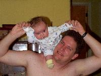 Jada on Papa's shoulders