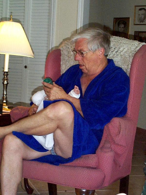 Grandpa C feeding Jada