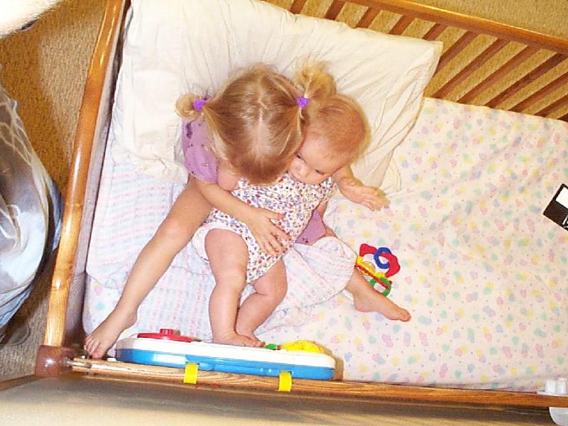 Jordan showing Jada how to play
