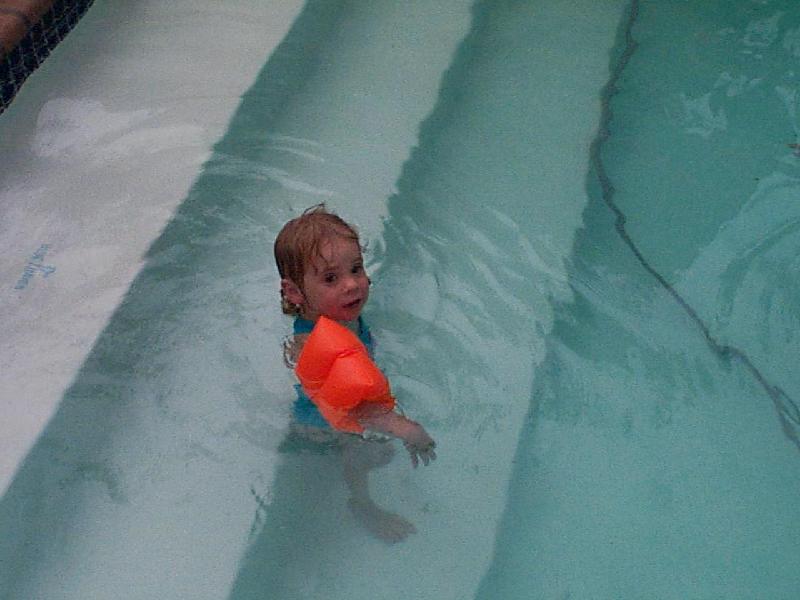 Jordan swimming on the steps