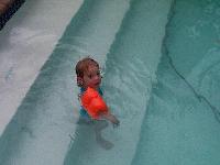 Jordan swimming on the steps