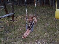 Jordan in the big girl swing