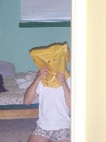 Chip demonstrates the use of the bag costume