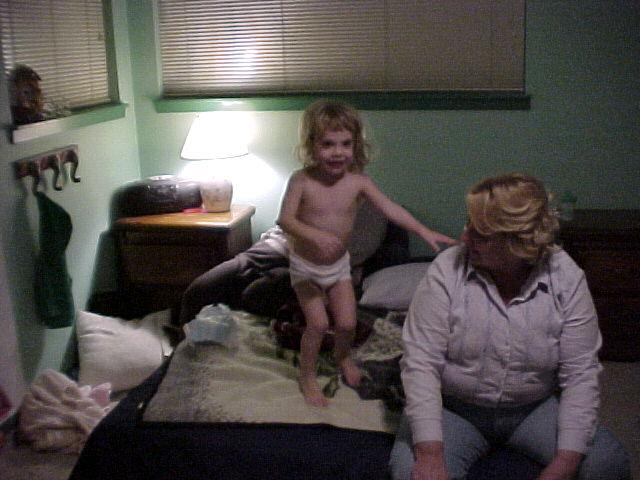 Jordan jumping with Grandma