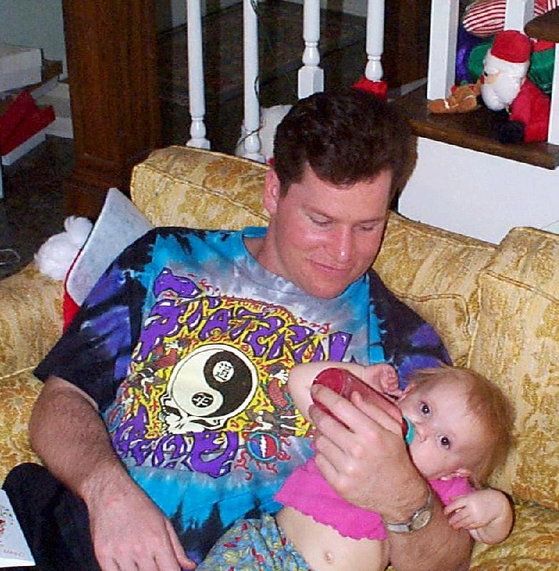 Uncle Scott feeding Jada
