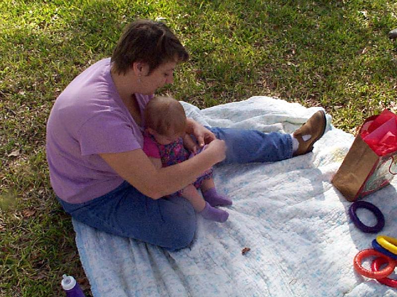 Jada opening presents, first birthday