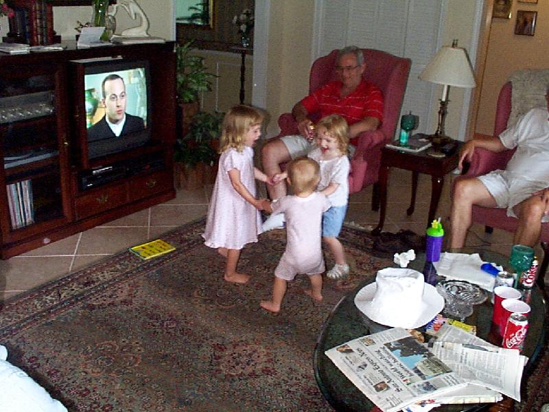 Girls playing Ring Around the Rosie