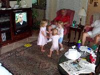 Girls playing Ring Around the Rosie