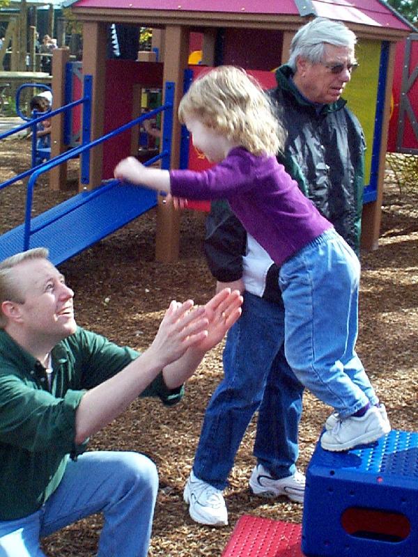 Nicole leaping to her Daddy