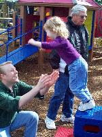 Nicole leaping to her Daddy