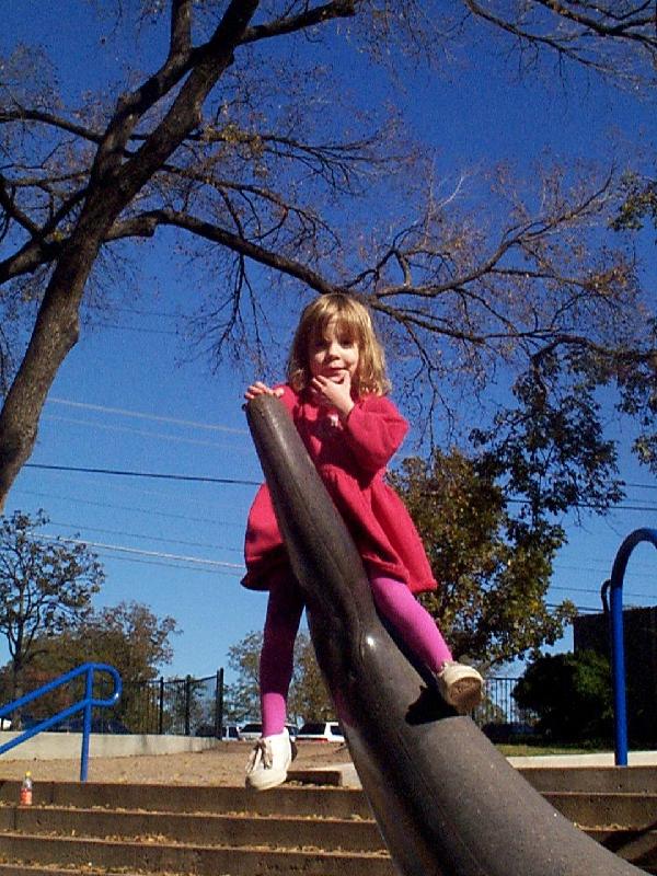 Sitting on the dolphin's tail