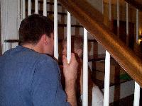 Scott and Jada playing on the stairs