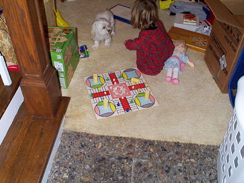 Jordan setting up the Parcheesi game - without the instructions!