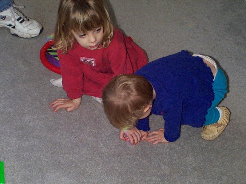 hard to tell, but they're chasing rainbows on the floor