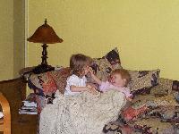 Jordan and Jada snuggling on the couch
